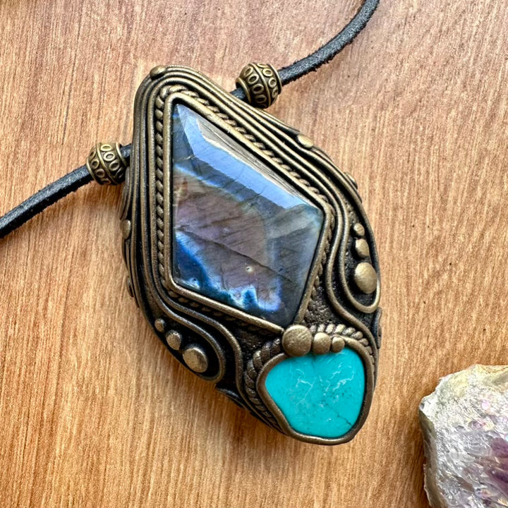 Necklace with crystals and gemstones  on a wooden surface