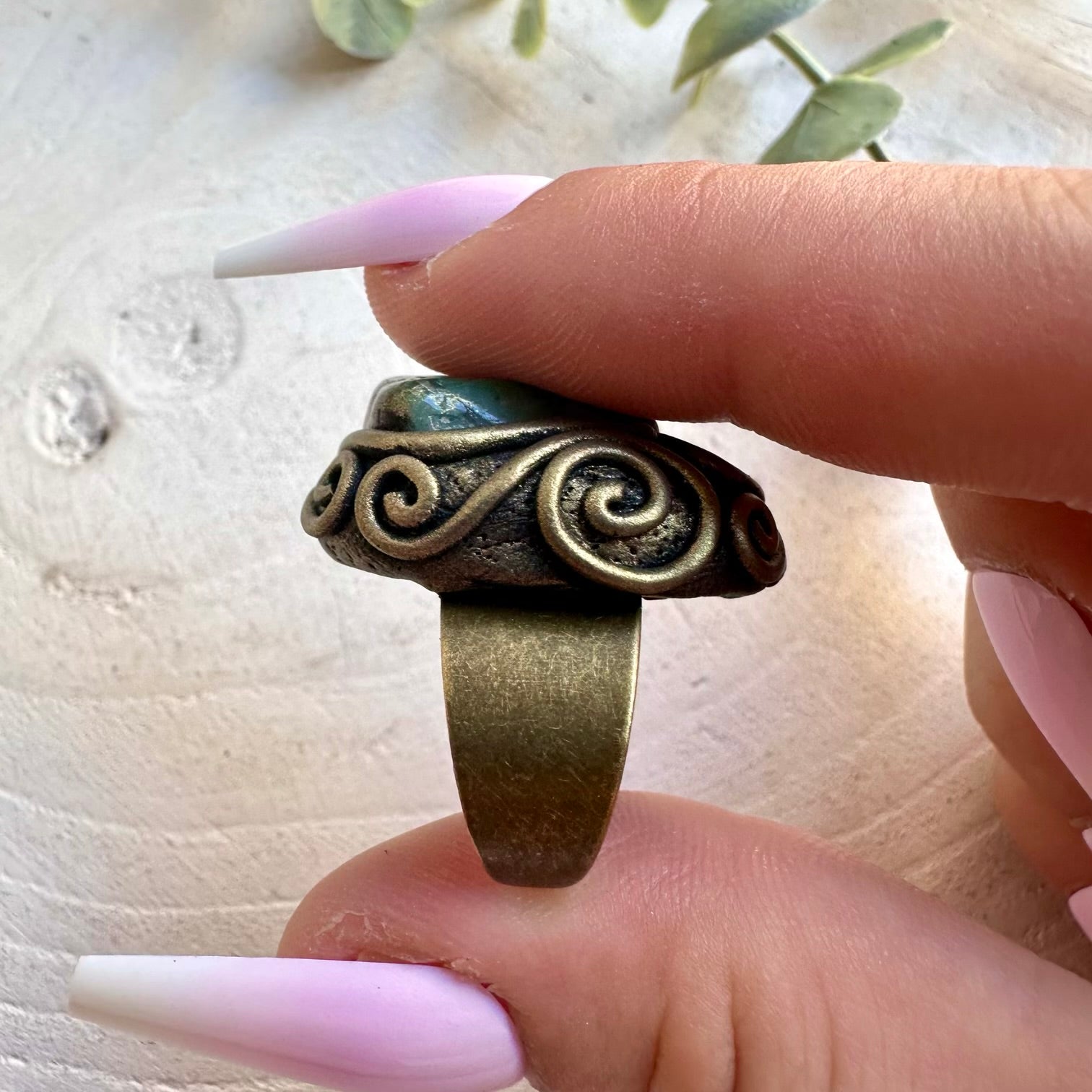 Artisan ring featuring natural Emerald and Raw Ethiopian Opal in a unique handmade setting.