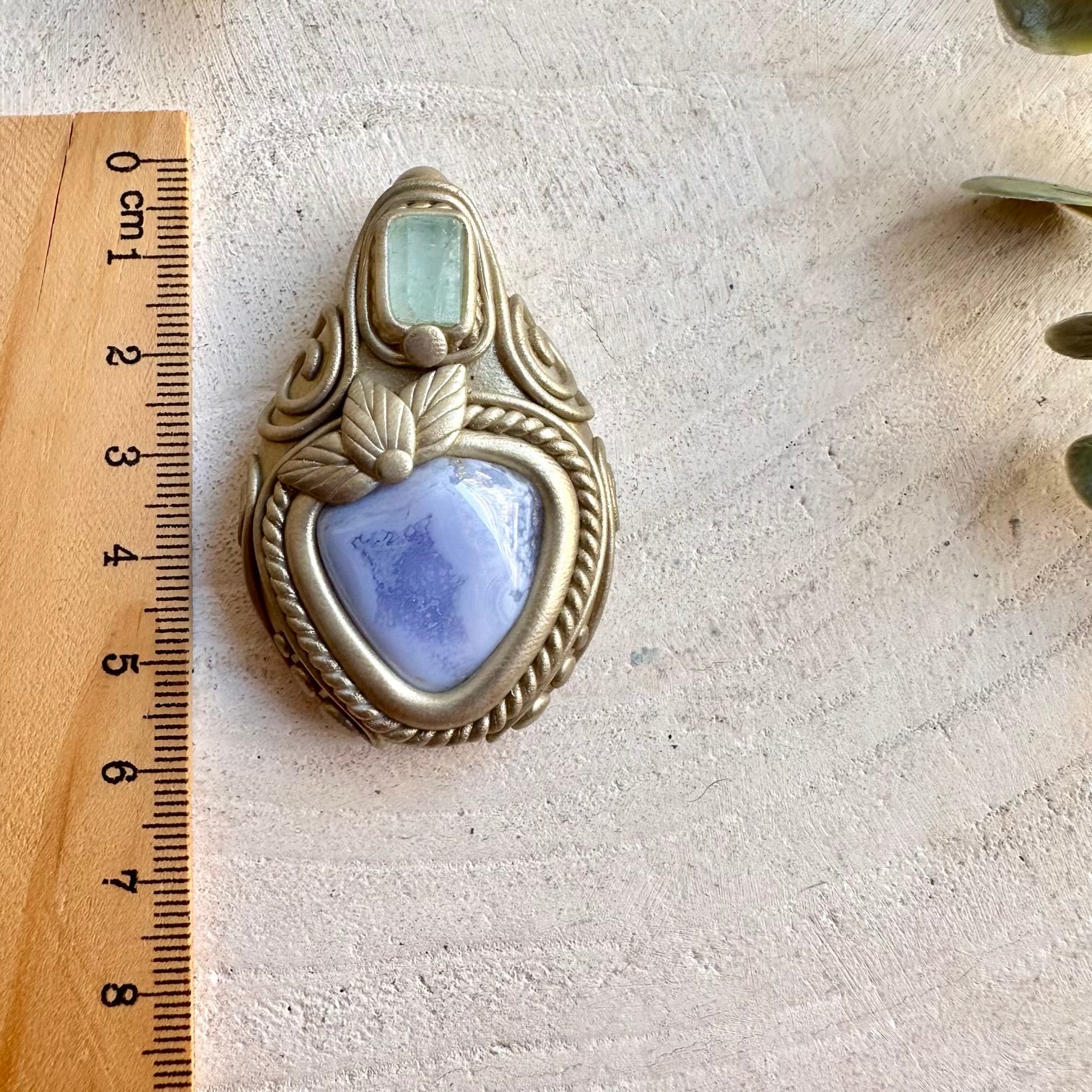 Handmade Blue Chalcedony and Aquamarine pendant necklace, a one of a kind healing crystal jewelry piece combining soothing blue Chalcedony with delicate Aquamarine. An elegant spiritual gemstone necklace inspired by calm, clear communication, emotional balance, inner peace and peaceful energy.