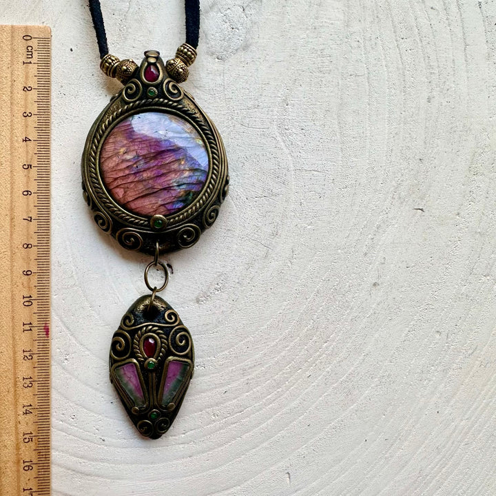 Artisan gemstone jewelry crafted with genuine natural crystals.