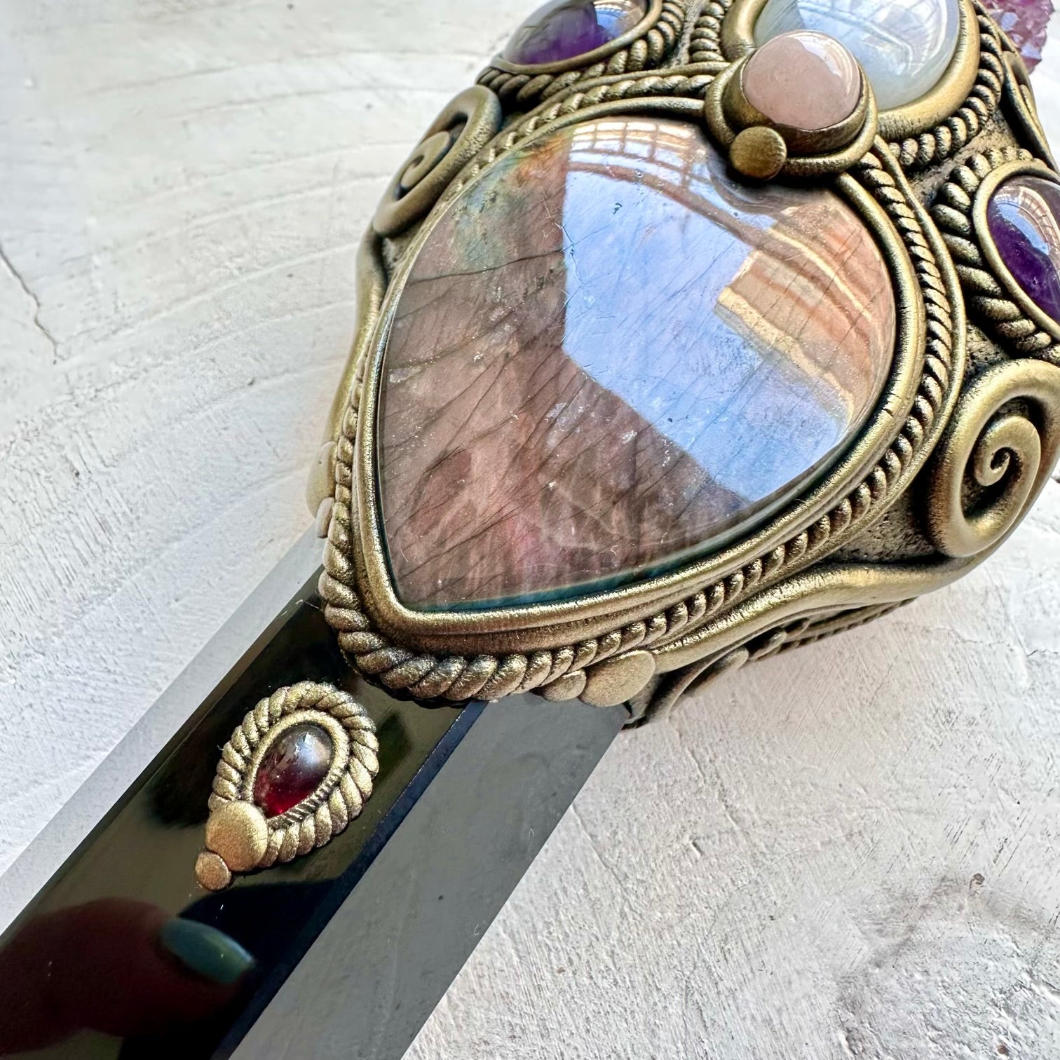 Handmade ritual tool crafted with Black Obsidian and a beautiful selection of healing crystals.