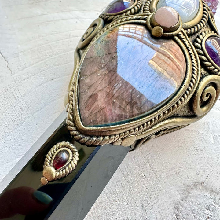 Handmade ritual tool crafted with Black Obsidian and a beautiful selection of healing crystals.