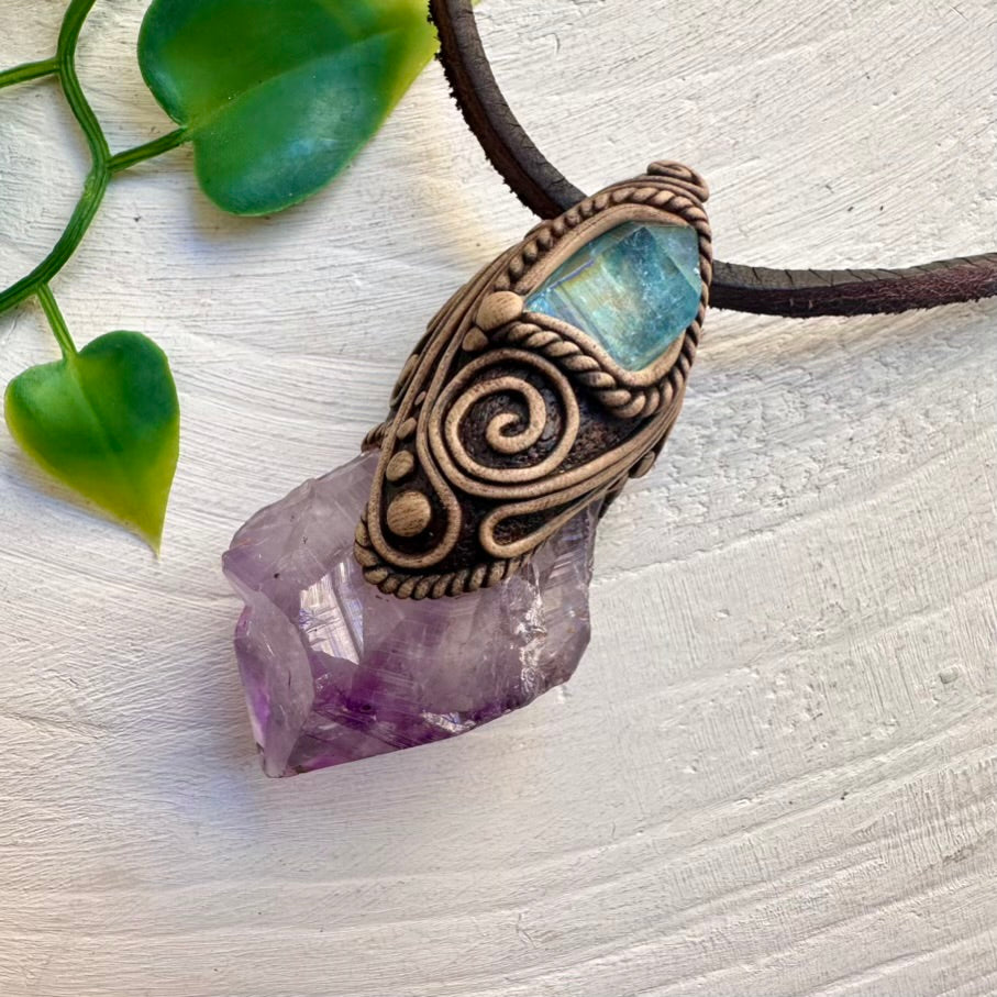 Artisan necklace featuring raw Amethyst and Aqua Aura Quartz