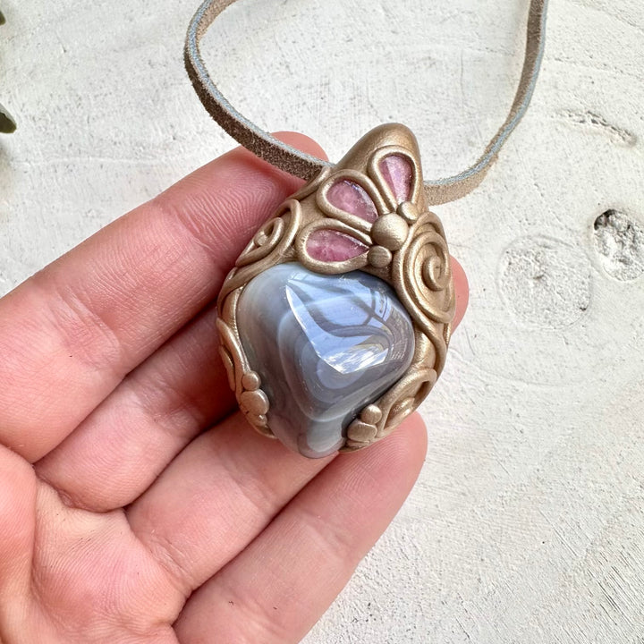 Healing crystal necklace with grounding and heart-centered gemstones