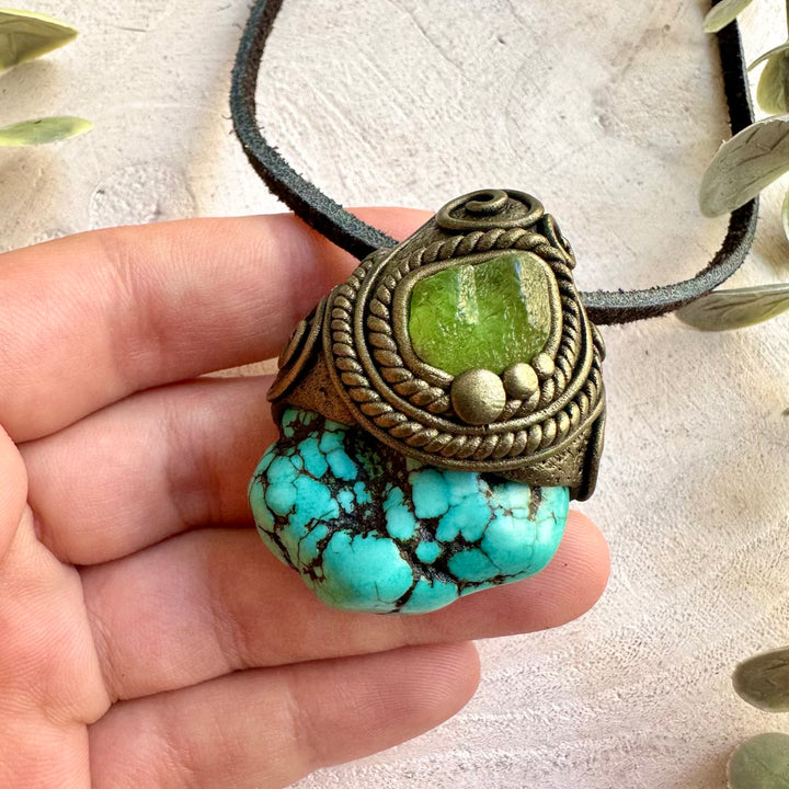 Handmade healing crystal jewelry with Turquoise and Peridot in a natural gemstone design.