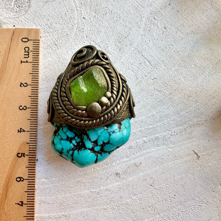 Unisex gemstone jewelry featuring Turquoise and Peridot in a unique handmade setting.