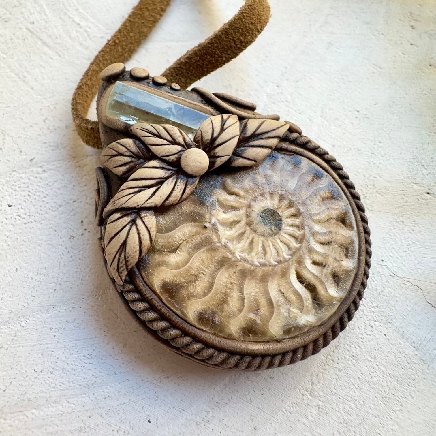 Natural ammonite fossil jewelry with aquamarine crystal one of a a kind