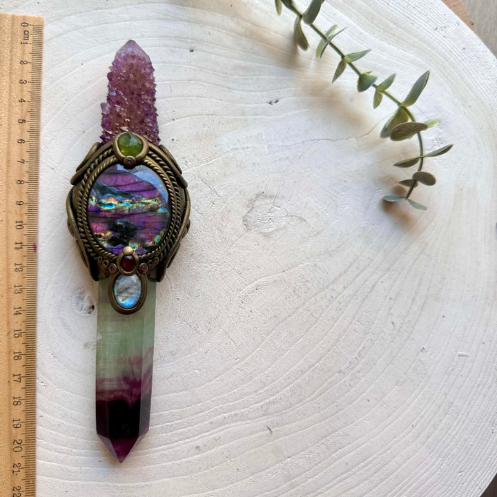 Unique healing crystal wand with Rainbow Fluorite, Deep Purple Spirit Quartz, Purple Labradorite, Rainbow Moonstone, Raw Peridot, Rhodolite Garnet and Ruby.