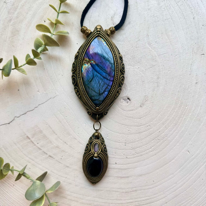 A one of a kind crystal talisman designed for intuition, creativity, emotional balance and spiritual transformation with healing crystals including labradorite, amethyst, and boulder opal.