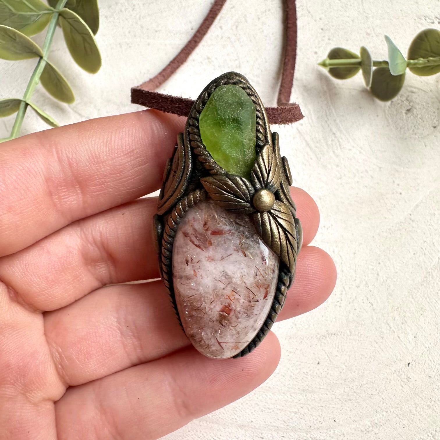 Handmade crystal necklace with Hematite Quartz and Peridot for meditation, altar tools, and spiritual rituals.