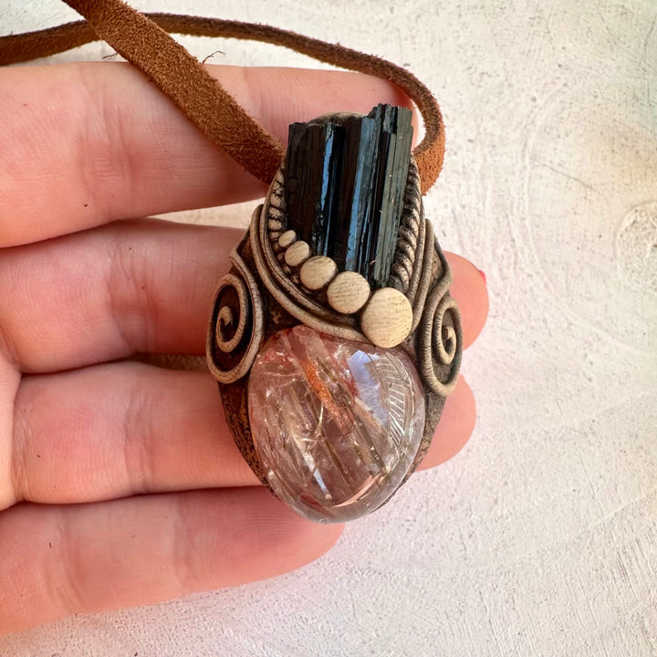 Close up of Red Quartz and Black Tourmaline pendant necklace