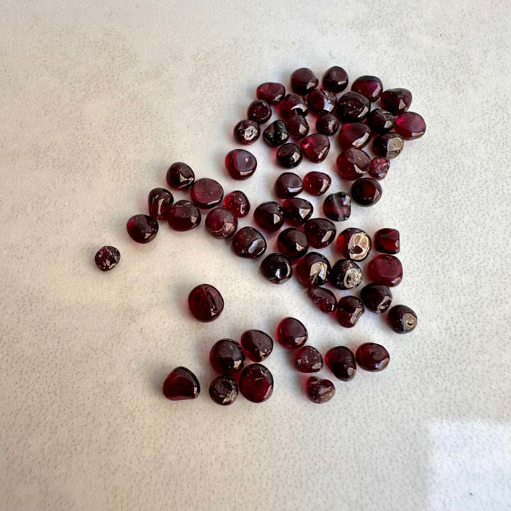 Tiny polished garnet stones for jewelry making