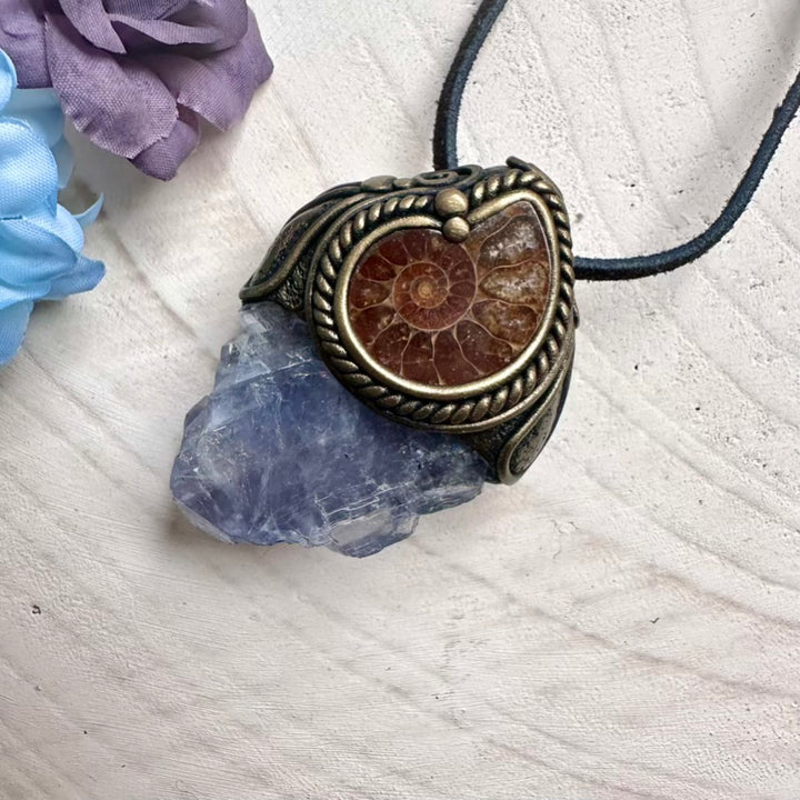 Natural Light Blue Fluorite and Ammonite pendant necklace, ethically sourced artisan metaphysical jewelry.