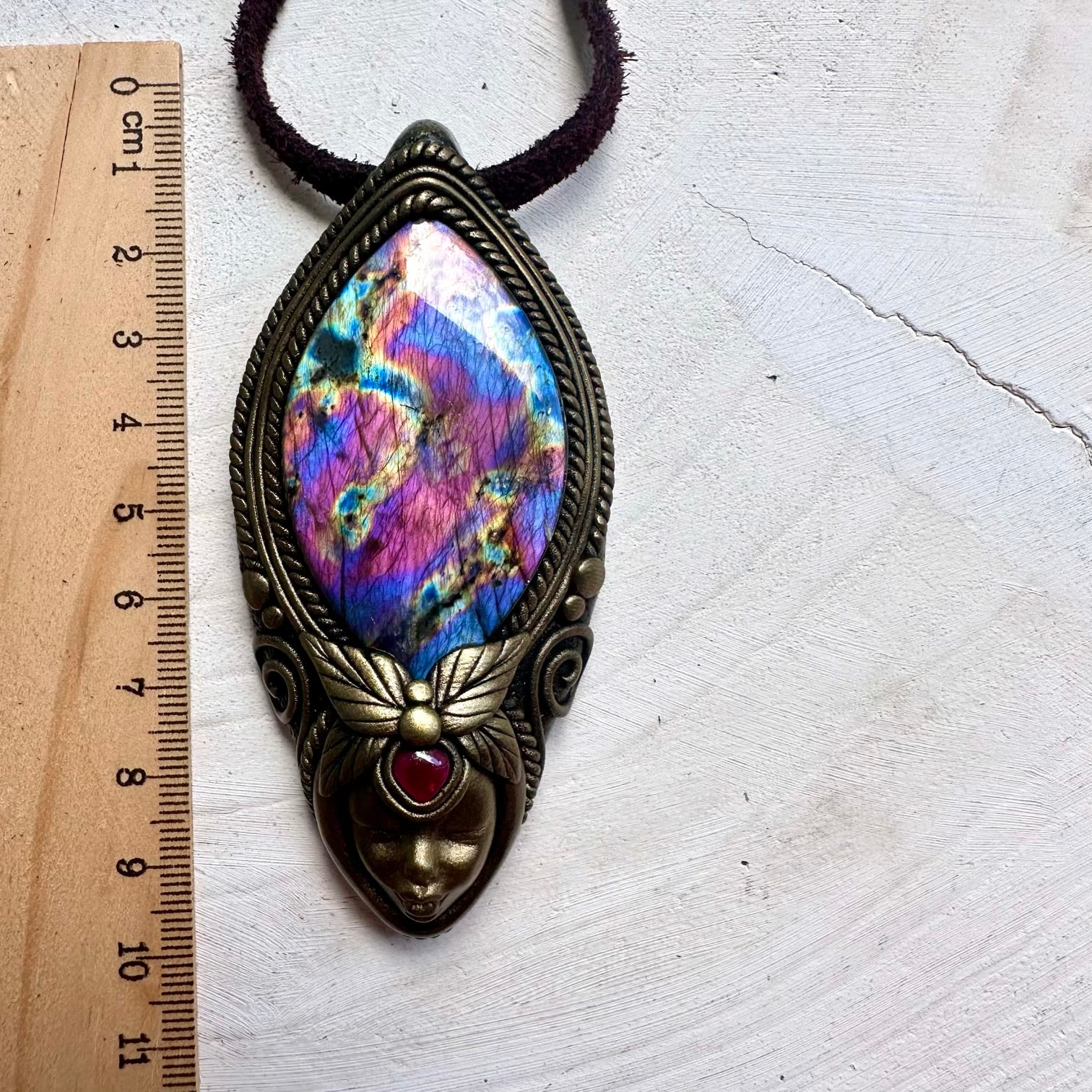 Spiritual gemstone necklace inspired by feminine energy and transformation