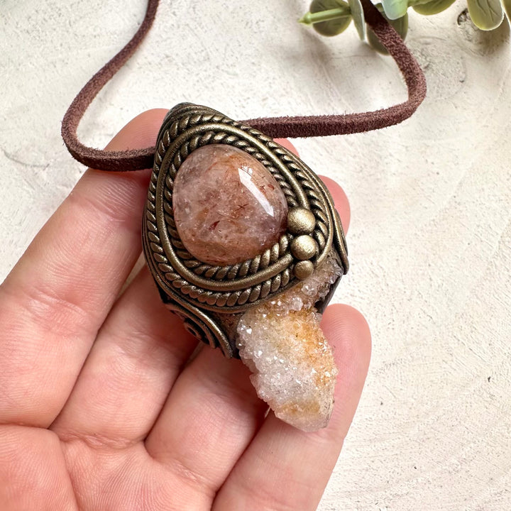 Handmade crystal necklace with Spirit Quartz and Hematite Quartz for altar tools, meditation, and rituals.
