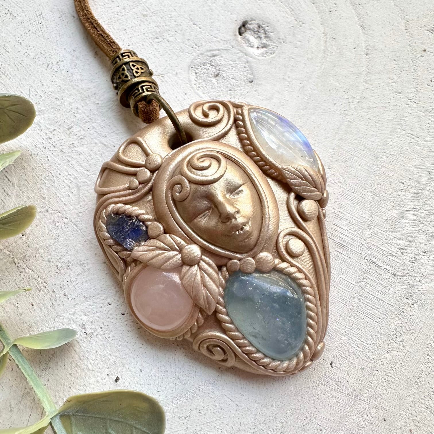 Artisan clay necklace with rose quartz and tanzanite gemstones