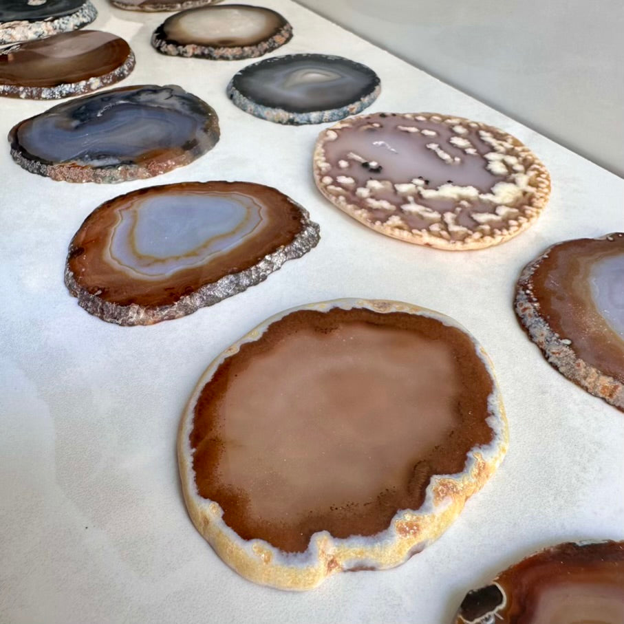 Agate slices on a white surface