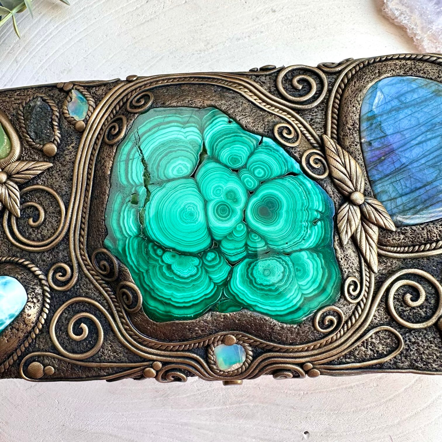 Witchy altar decor with labradorite and larimar gemstones