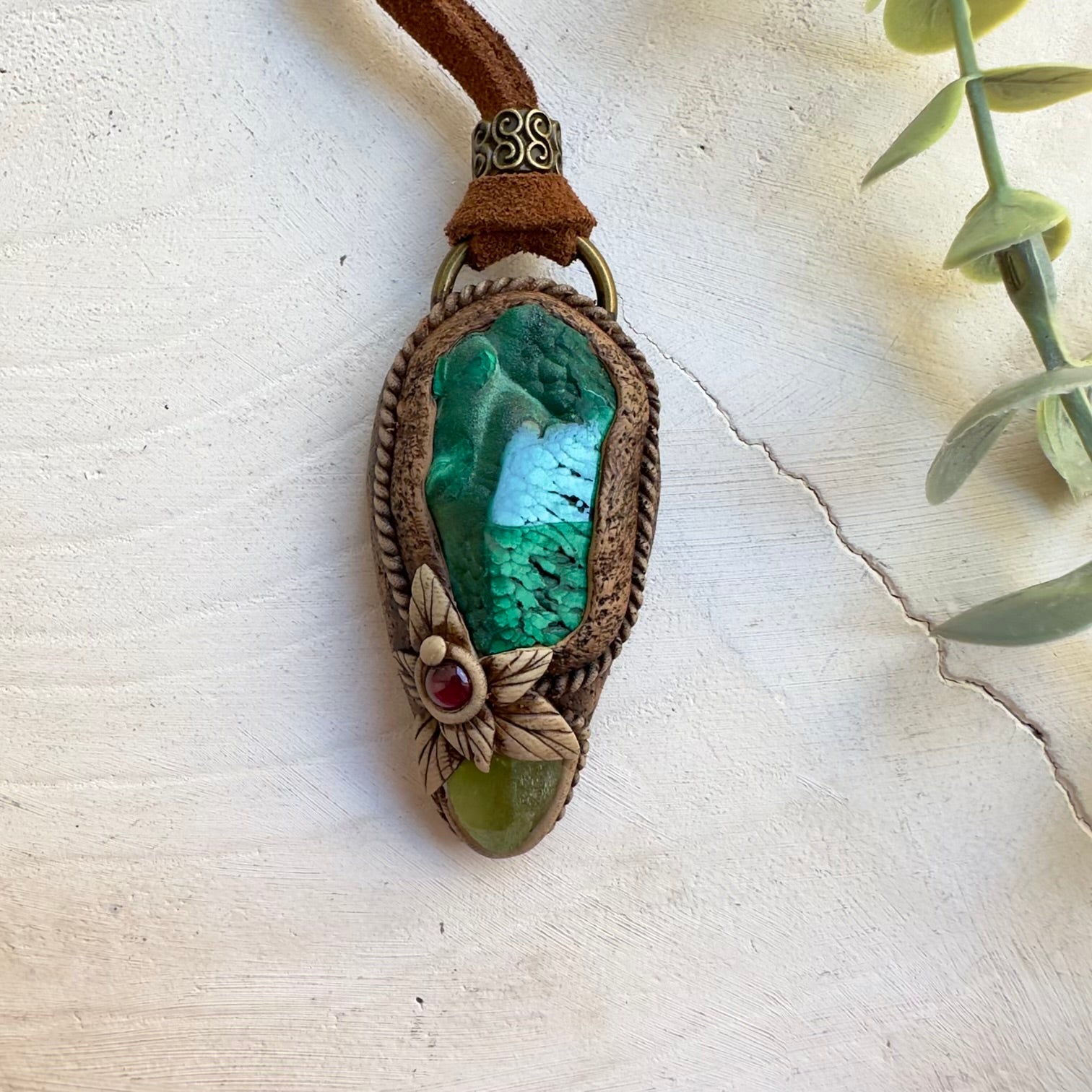 Unisex gemstone necklace inspired by transformation and renewal