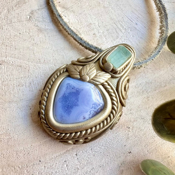 Handmade healing crystal jewelry showcasing Blue Chalcedony and Aquamarine gemstones.