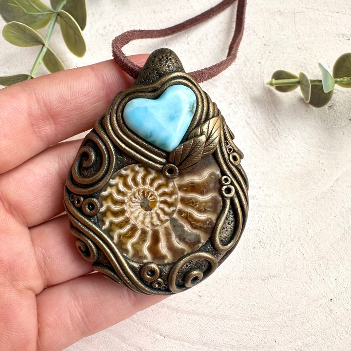 Natural larimar gemstone necklace with heart pendant and ammonite fossil accents