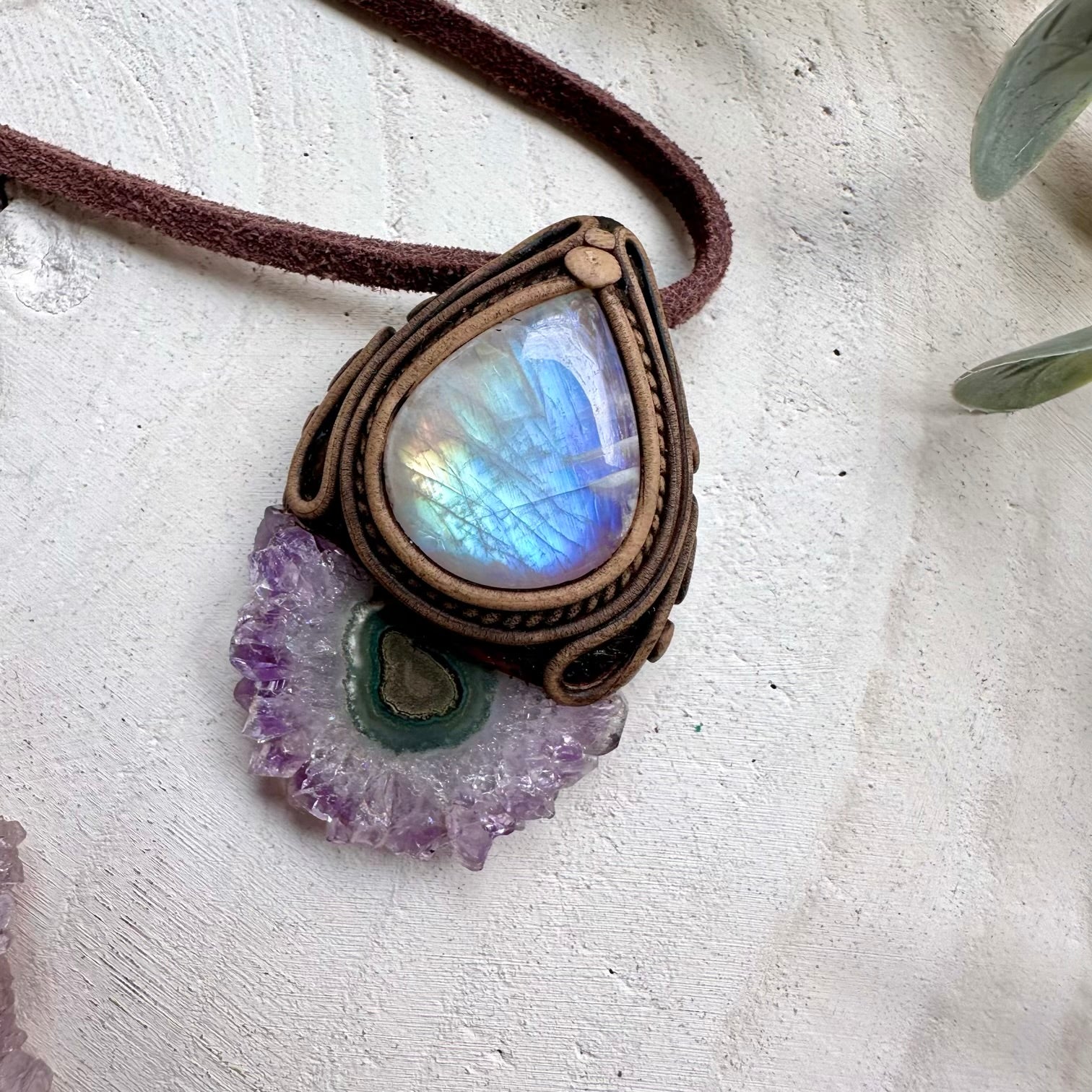 Amethyst stalactite paired with rainbow moonstone in a necklace