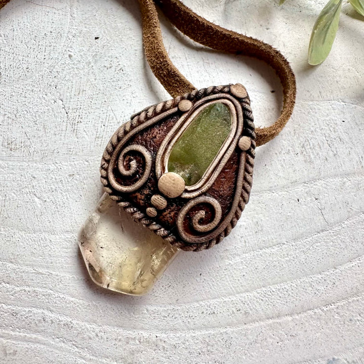Handmade healing crystal necklace featuring Citrine for abundance and Peridot for renewal.