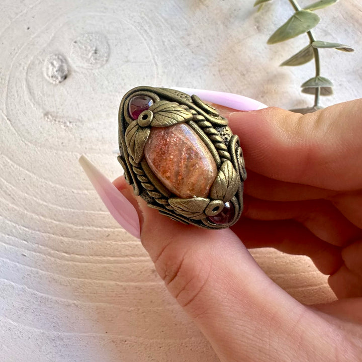 Sunstone and Rhodolite Garnet ring handcrafted with genuine natural gemstones.