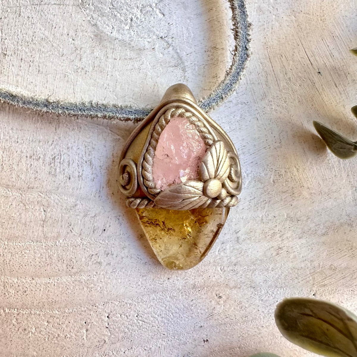 Handmade pendant necklace featuring polished Citrine and Morganite gemstones.