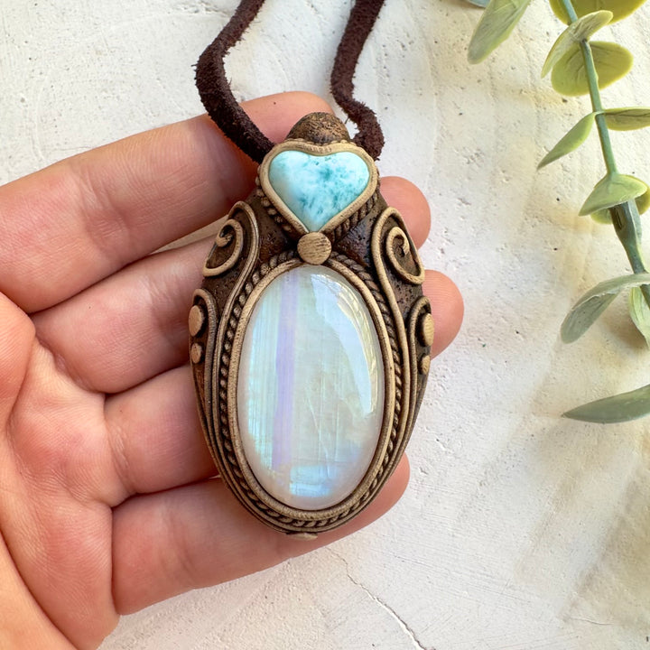 Natural crystal jewelry featuring a heart-shaped Larimar