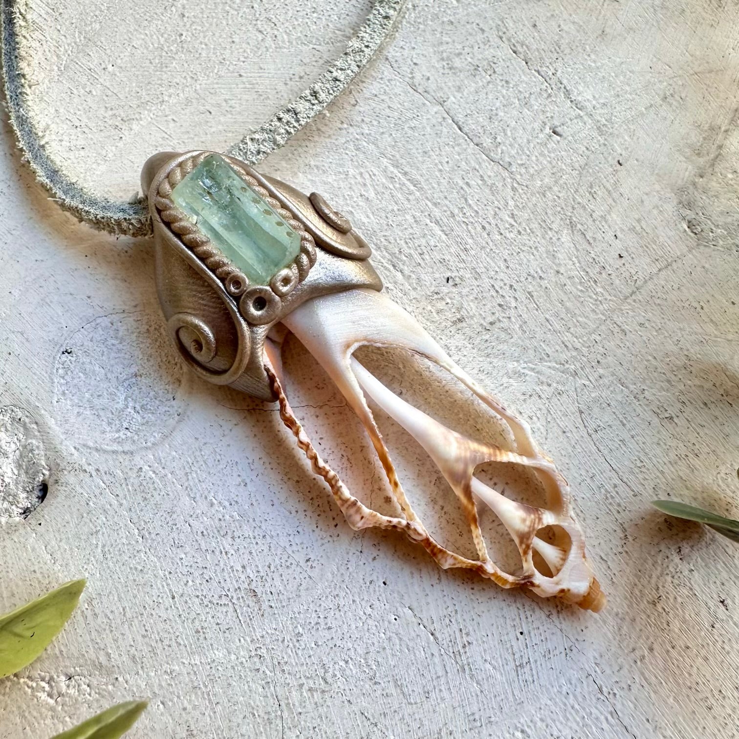 Protection amulet crystal necklace with aquamarine and seashell slice