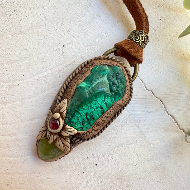 Malachite pendant necklace with peridot and garnet gemstones