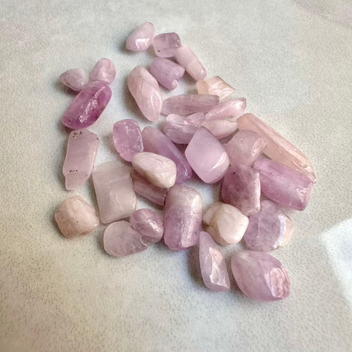 Pink crystal stones on a light gray background