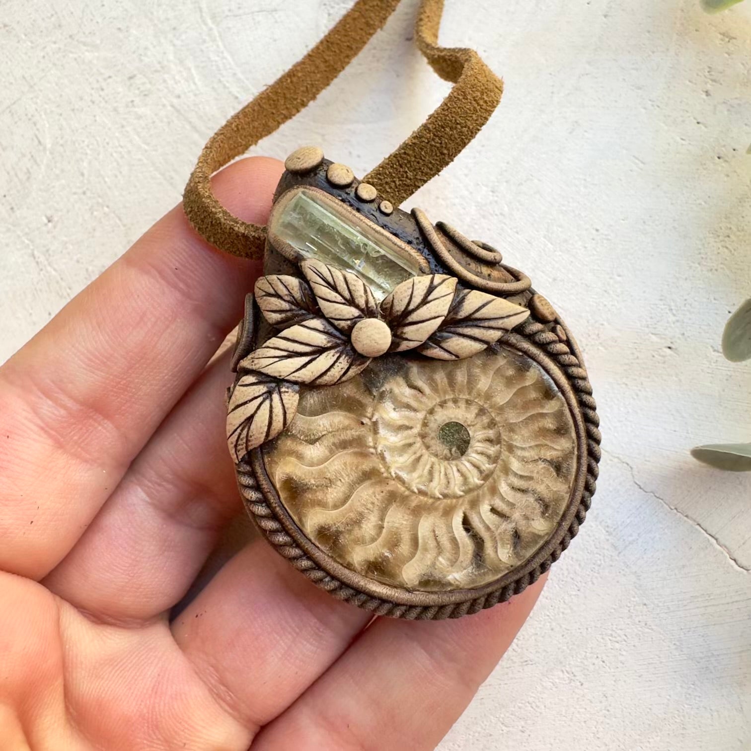 Unisex fossil crystal necklace with aquamarine stone