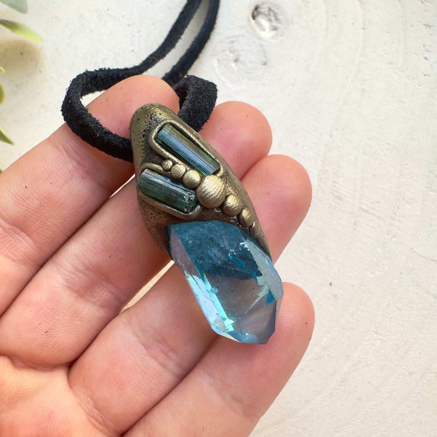 Ocean energy inspired crystal pendant necklace