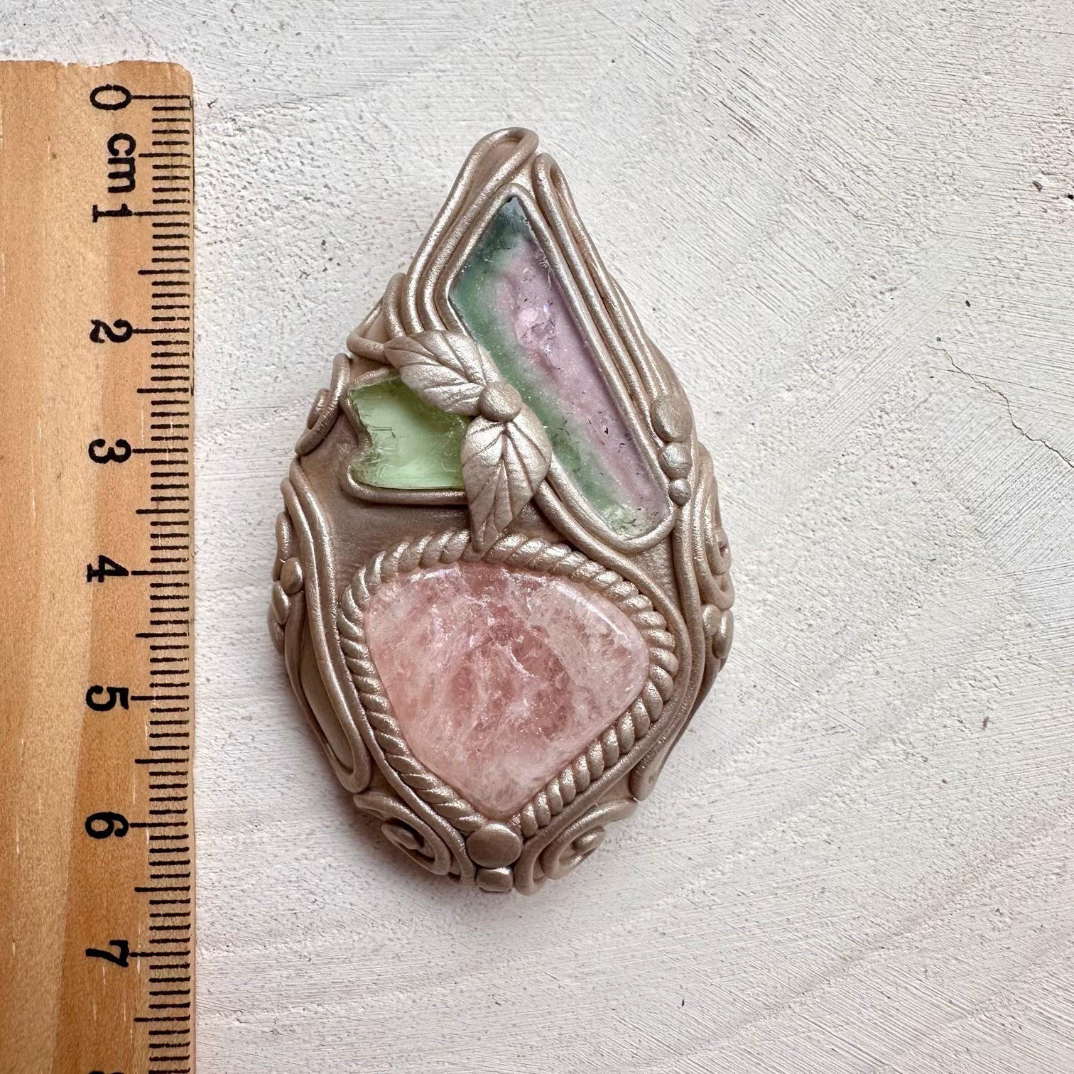Morganite paired with watermelon tourmaline and hiddenite in a necklace