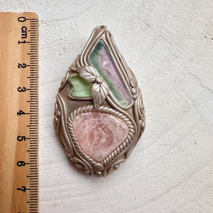 Morganite paired with watermelon tourmaline and hiddenite in a necklace