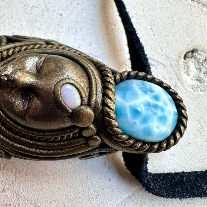 Labradorite paired with larimar and opal in a necklace