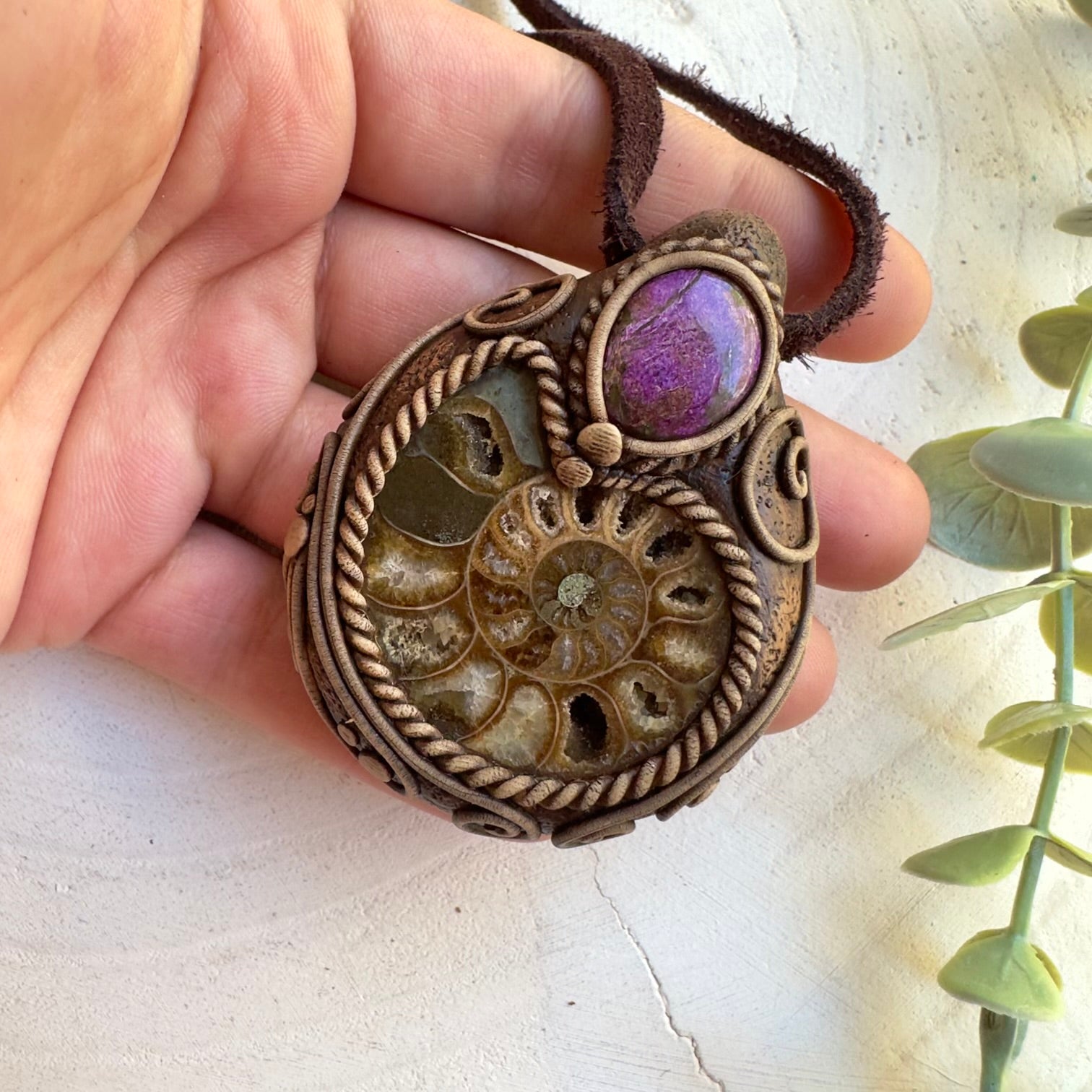 Artisan fossil jewelry with ammonite and stichtite stones