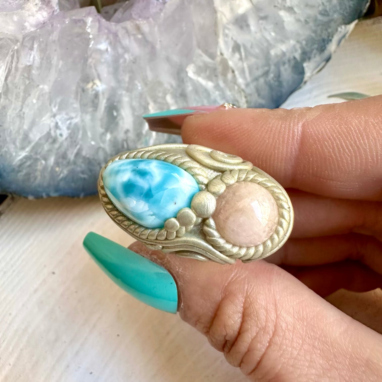 Larimar paired with morganite in a ring