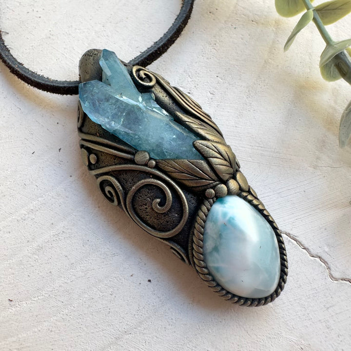 Spiritual jewelry with calming ocean blue gemstones aqua aura quartz and larimar