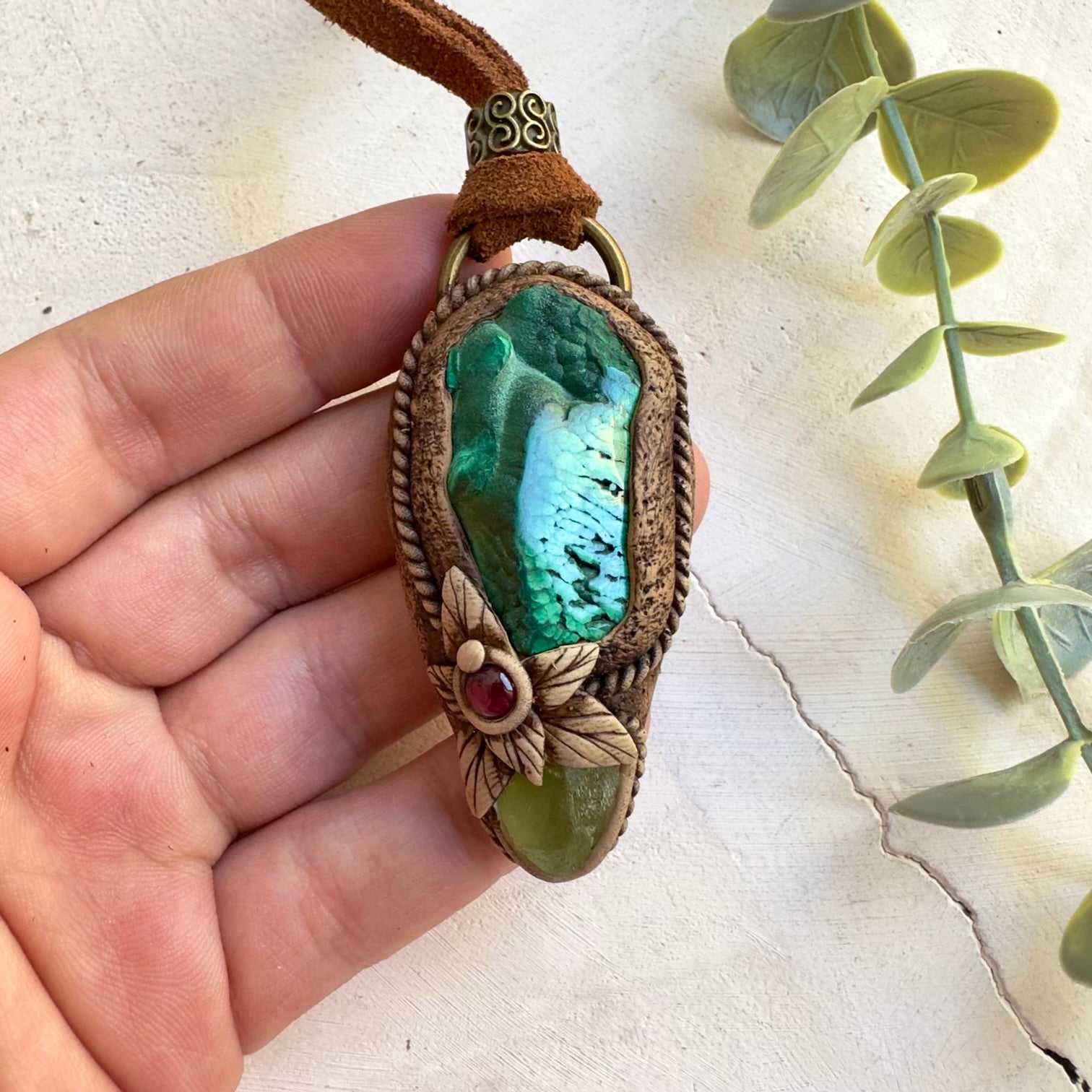 Natural malachite crystal pendant with garnet accents