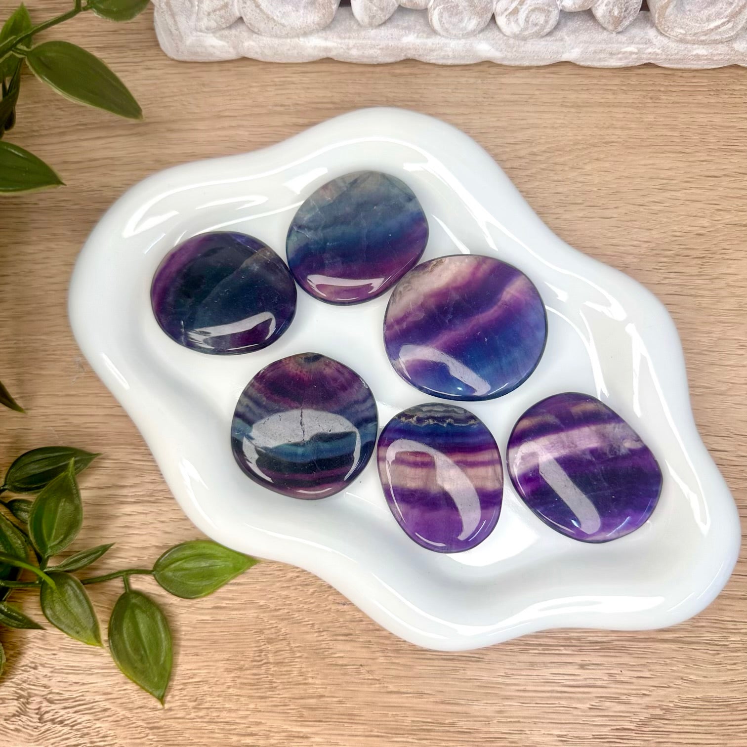 Natural rainbow fluorite flat stone for spiritual wellness