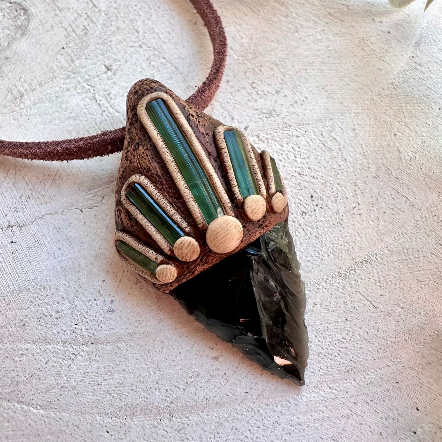 Spiritual obsidian and tourmaline crystal pendant for strength and emotional harmony