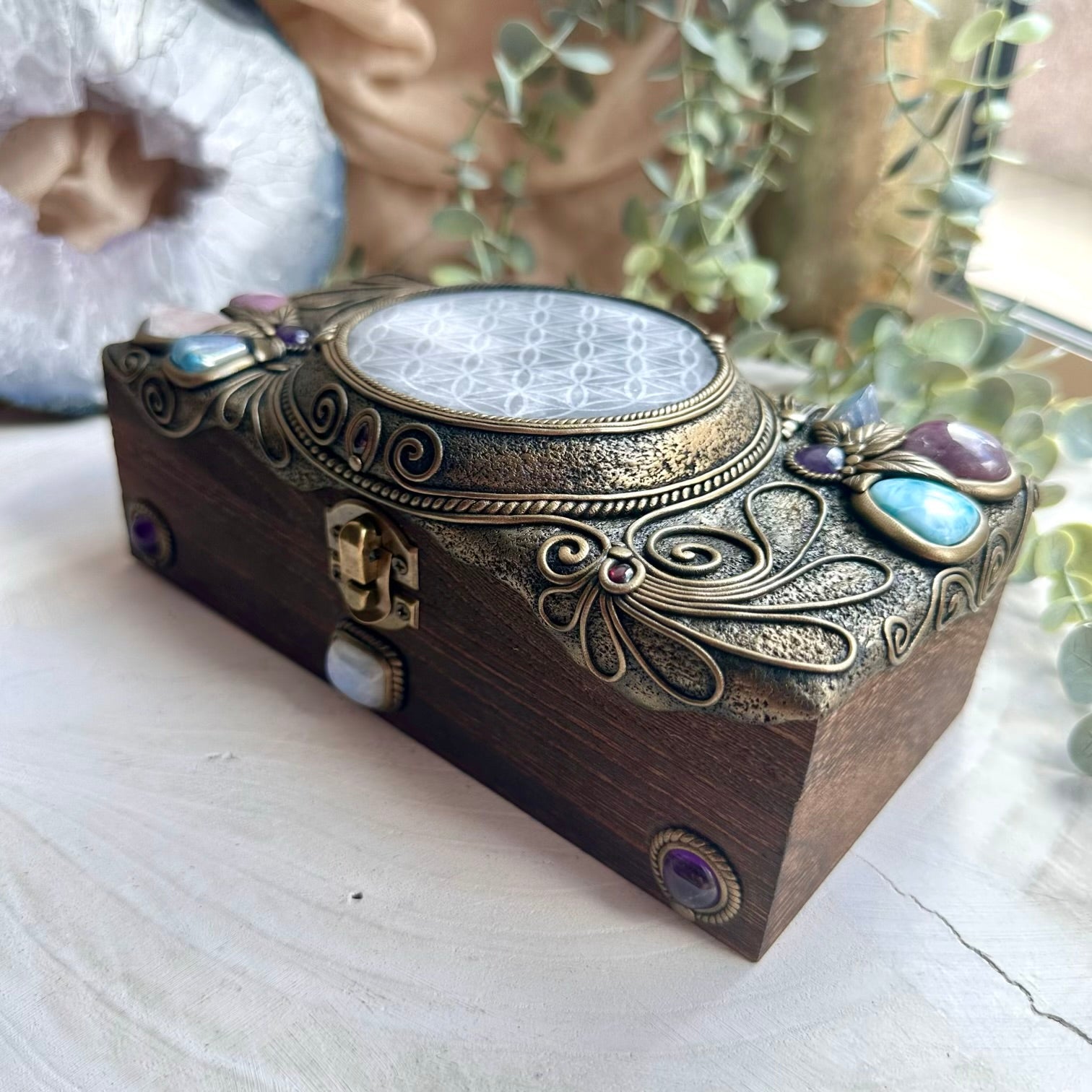 Mystical crystal storage box with larimar, stichtite, and moonstone crystal details