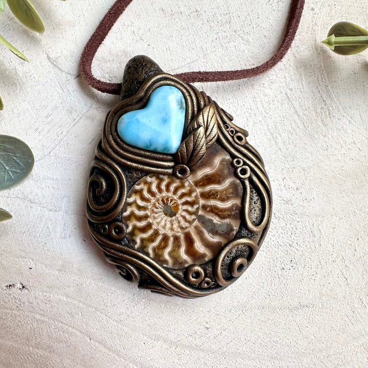 Healing crystal necklace for love and emotional balance with larimar and ammonite fossil