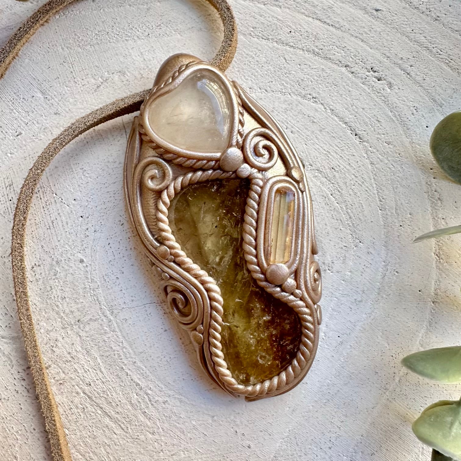 Spiritual jewelry combining citrine quartz heart and topaz