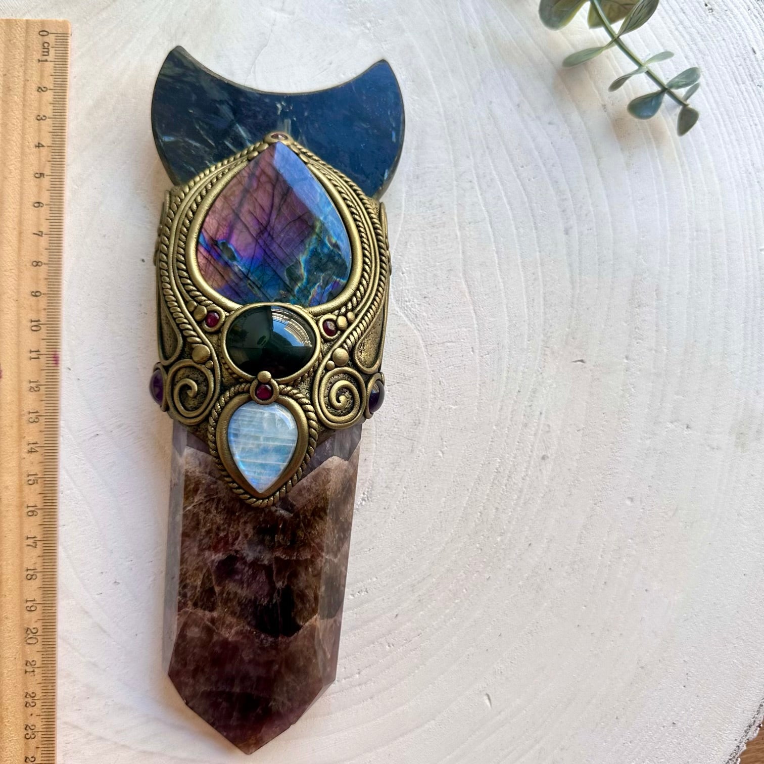 One of a kind healing crystal wand featuring Super Seven Quartz, Amethyst and Rhodolite Garnet.