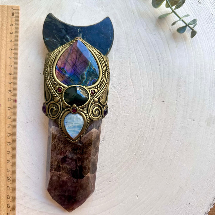 One of a kind healing crystal wand featuring Super Seven Quartz, Amethyst and Rhodolite Garnet.