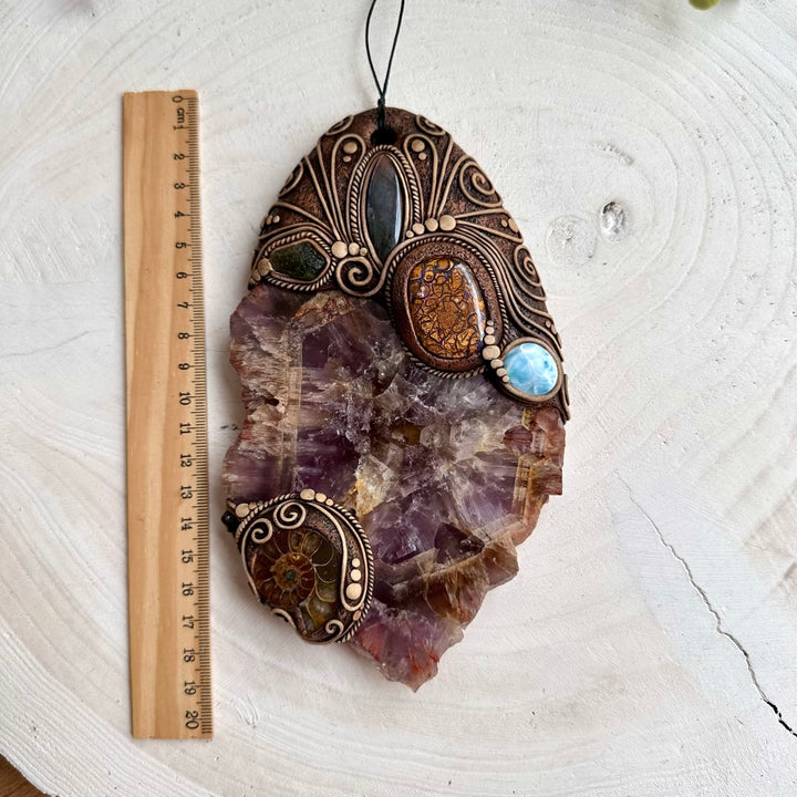 Unique spiritual wall art with larimar labradorite and red garnet crystals